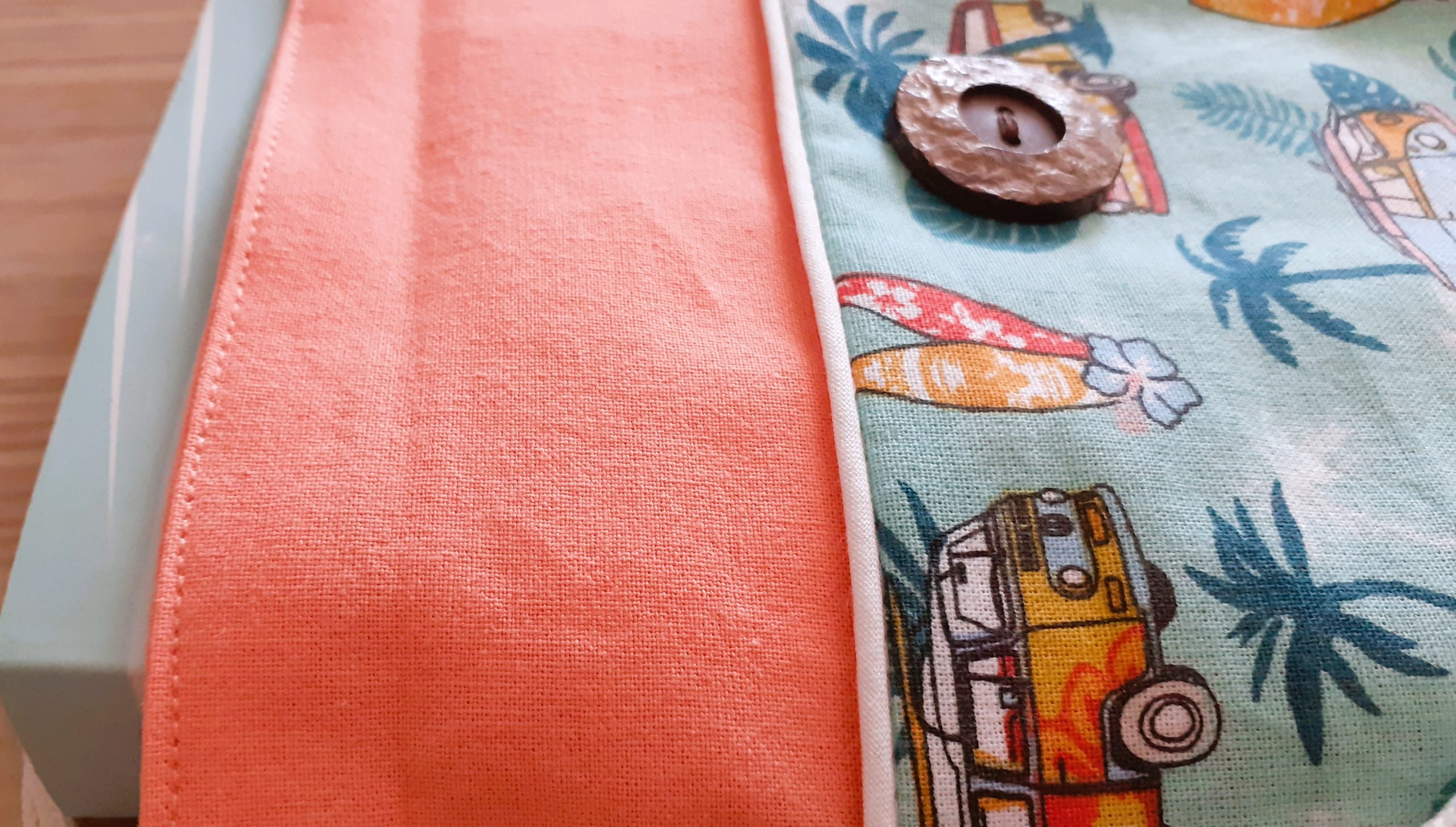 Pochette à livre corail vert van combi